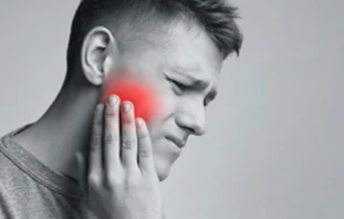 Chiropractic San Antonio, TX Man with TMJ Pain