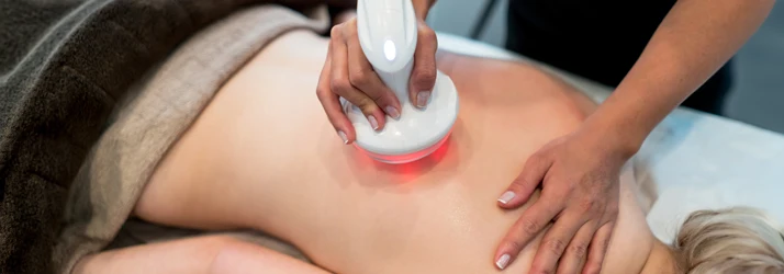Laser and red light therapy equipment at Moore Chiropractic in San Antonio