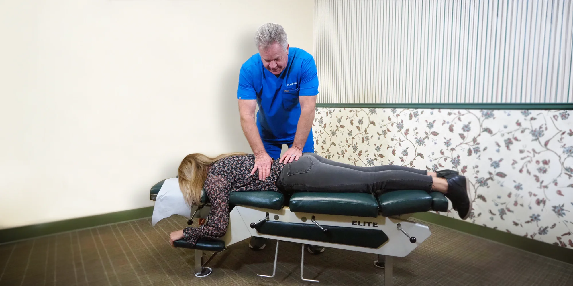 Dr. Andrew Moore providing chiropractic care to a patient