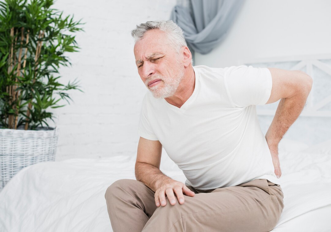 Patient experiencing lower back and radiating leg pain